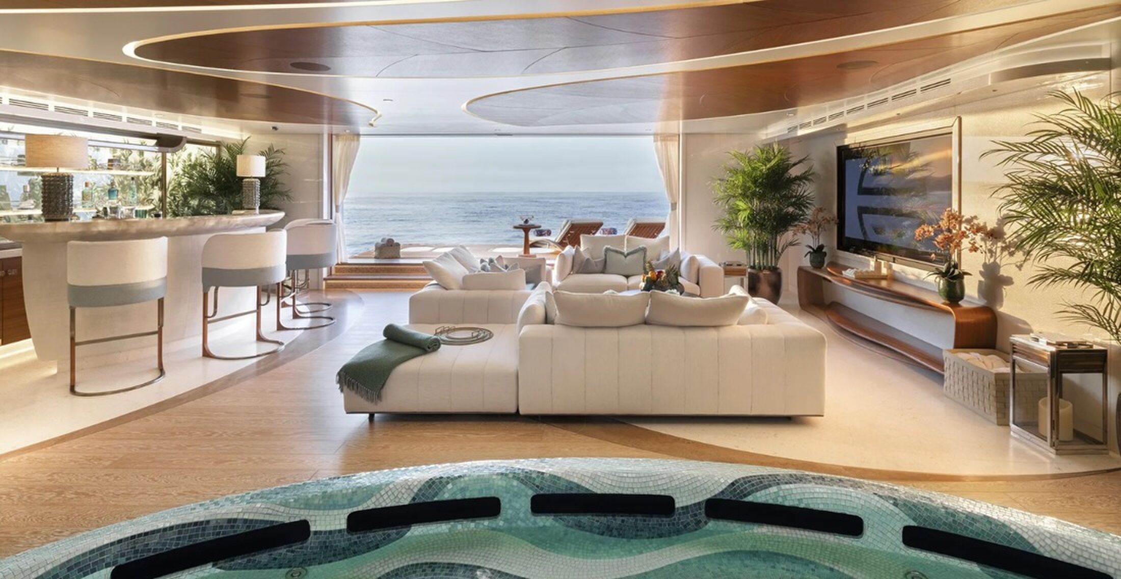 De luxueuze living met uitzicht op zee