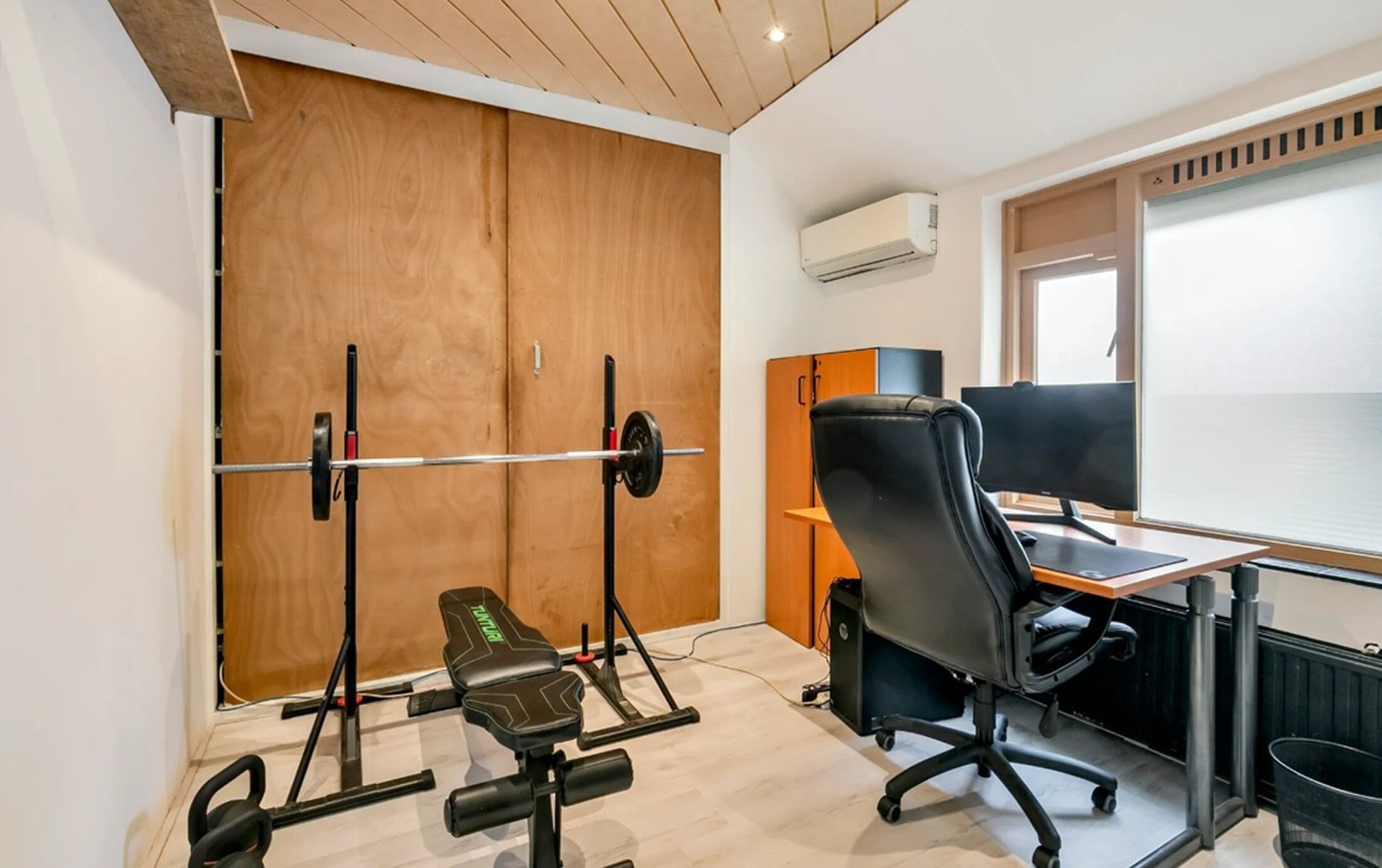 De sportschool en werkkamer