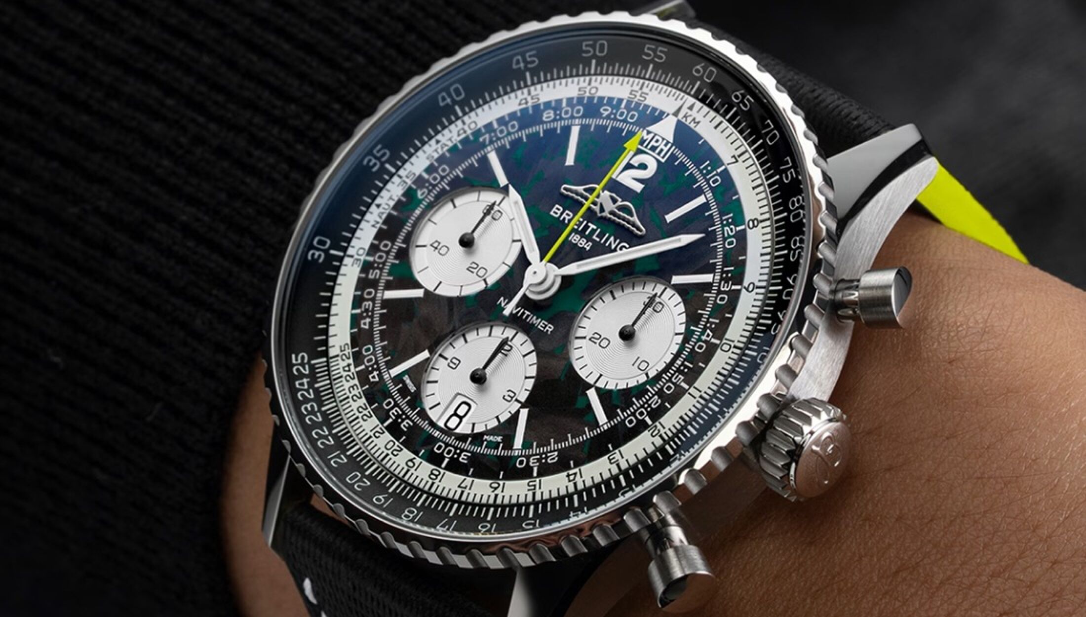 Het horloge van Breitling en Aston Martin
