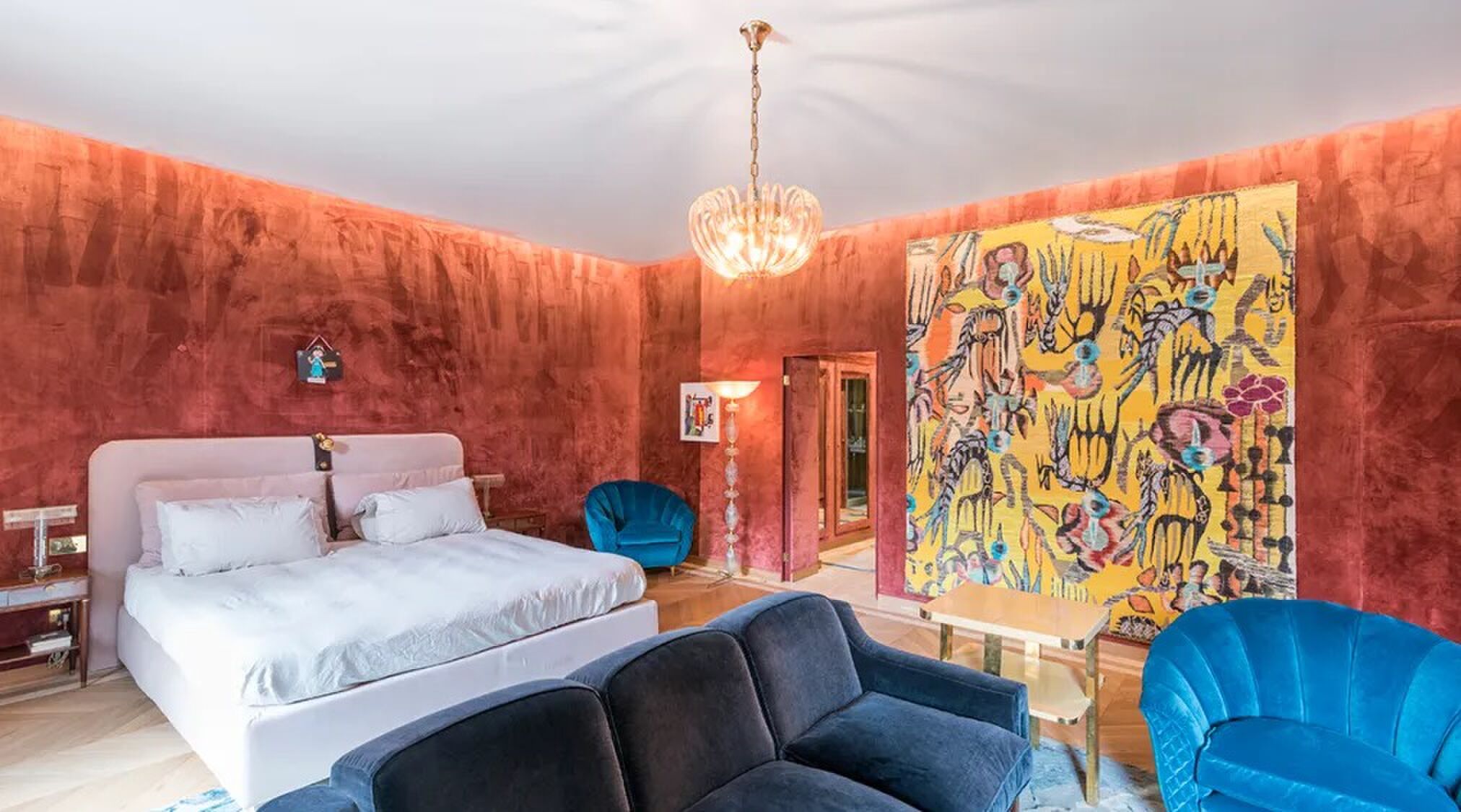 Eén van de slaapkamers van het penthouse in Rome