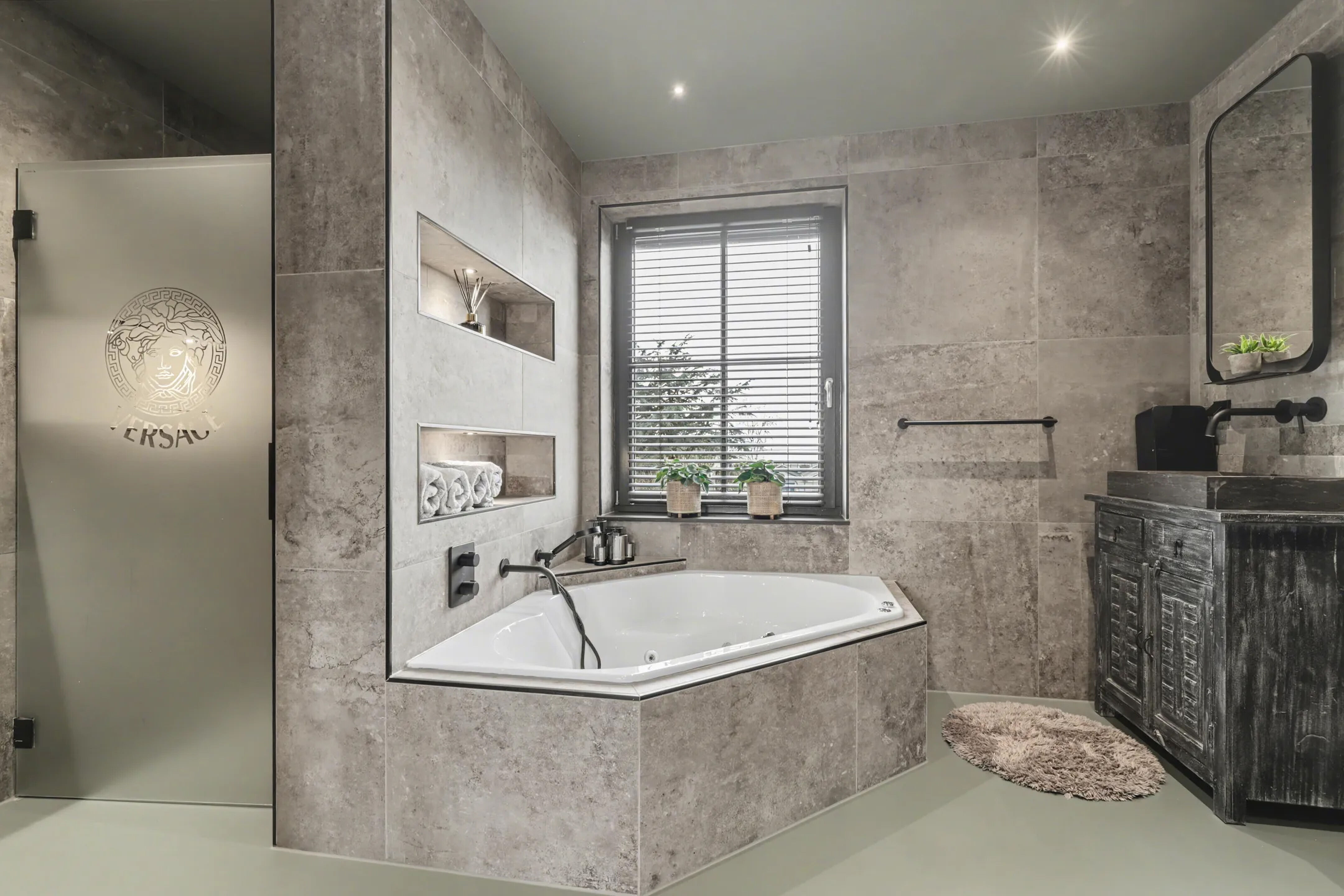 De badkamer van de villa in Monster