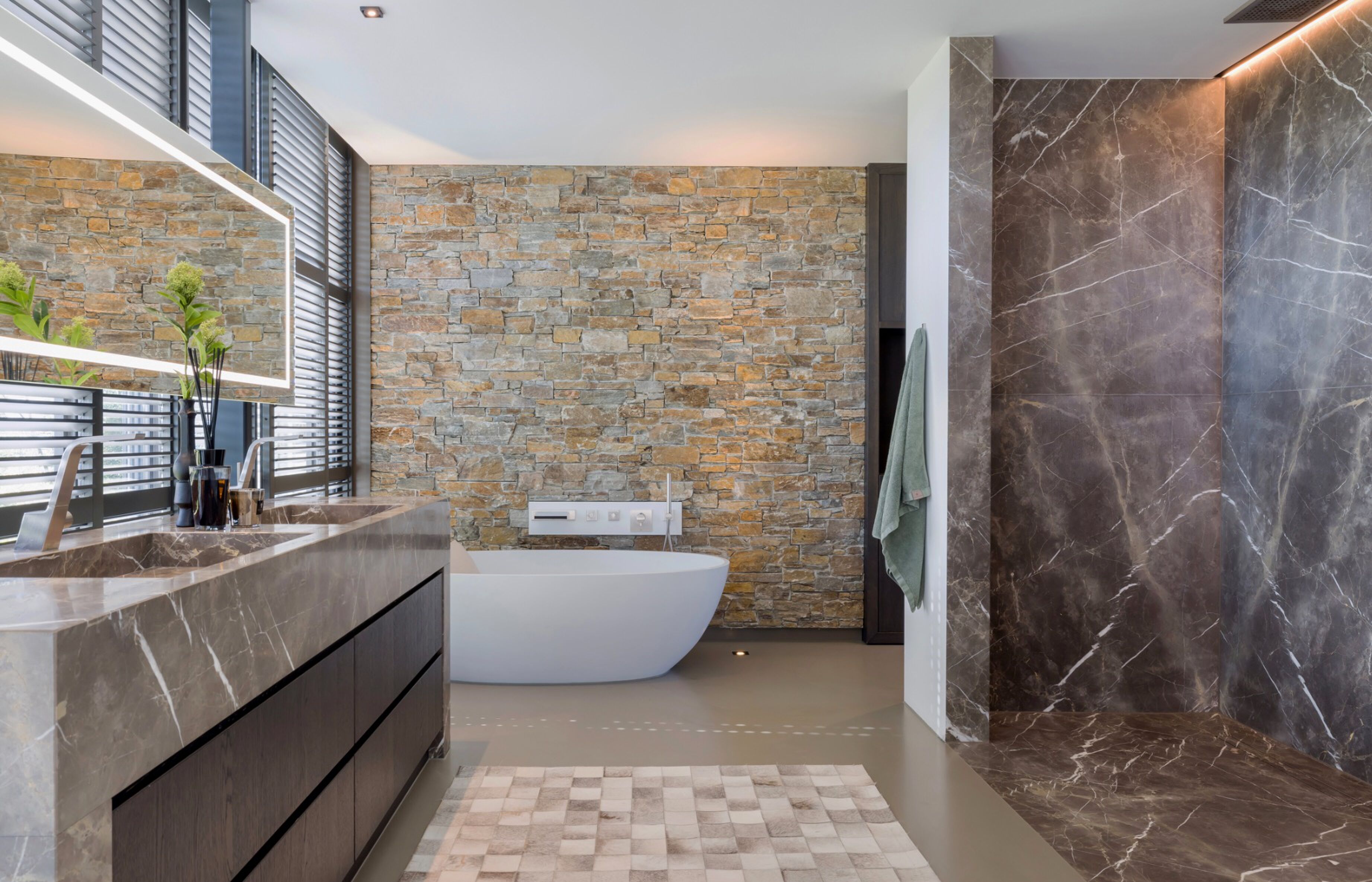 De badkamer in de villa in Sint-Oedenrode