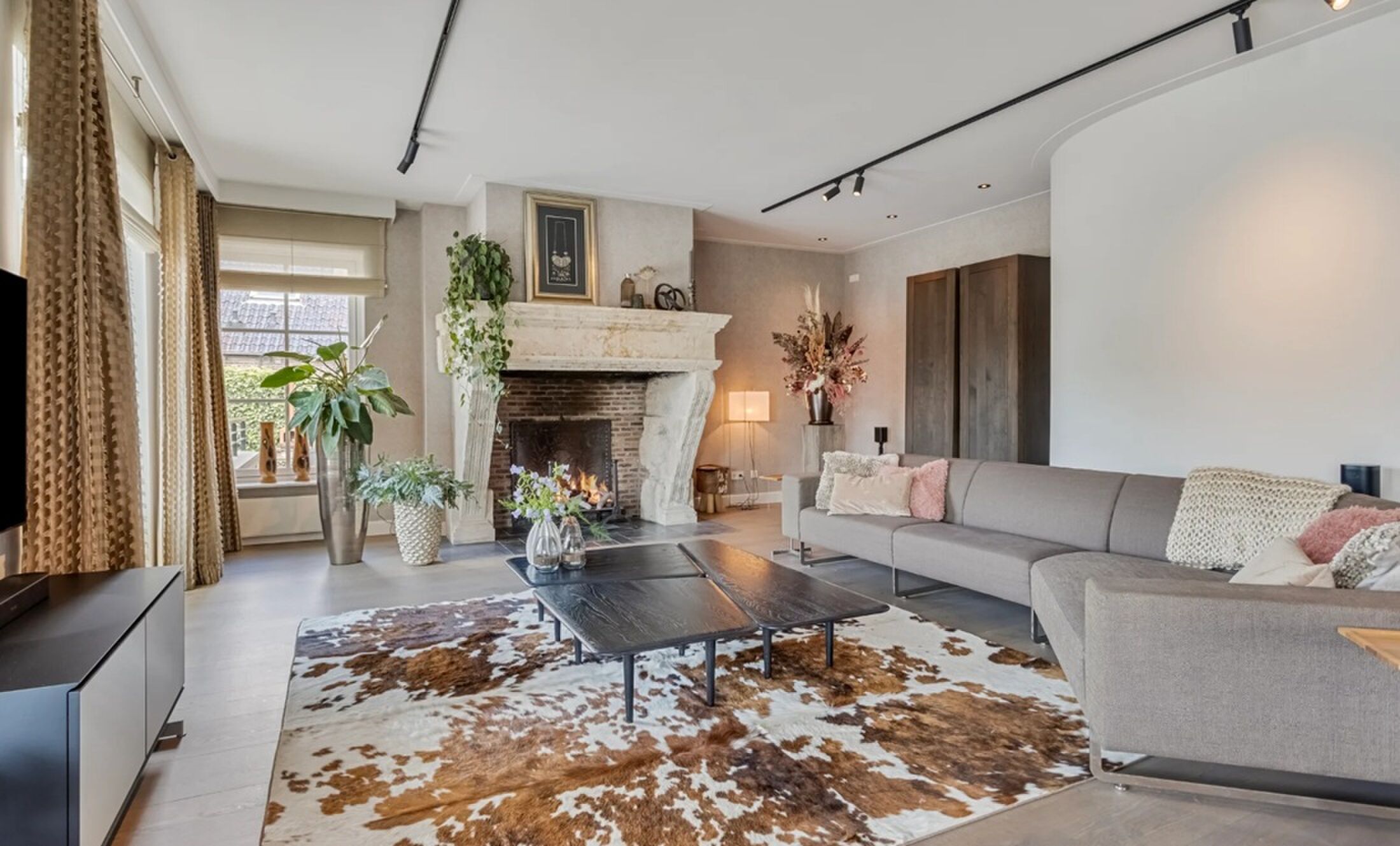 De living van de zomerse villa op Funda