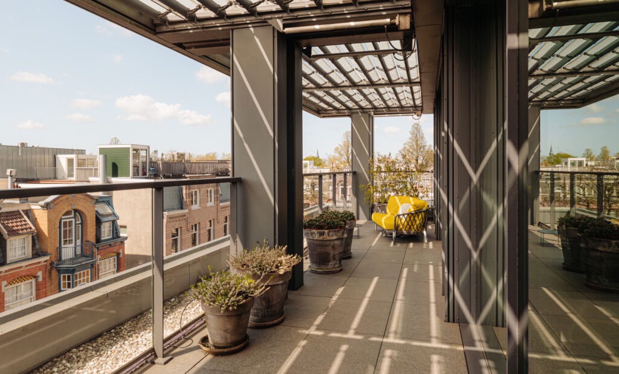 Het uitzicht vanuit het penthouse in Amsterdam