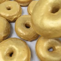 gouden proseccodonut bij drake's boutique Pure Luxe