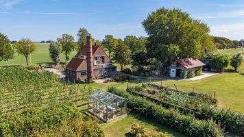 De woning met eigen wijngaard van boven