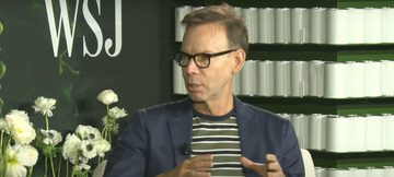 Miljardair Steve Ells tijdens een interview met Wall Street Journal