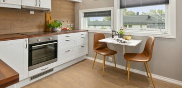 Een foto vter illustratie an een minimalistische keuken
