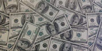 Een aantal dollarbiljetten van miljonairs in de Verenigde Staten