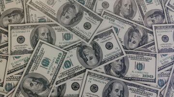 Een aantal dollarbiljetten van miljonairs in de Verenigde Staten