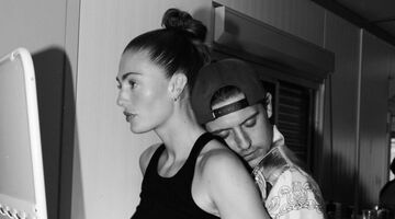 Een verliefde Lil' Kleine en Anna Groeneveld tijdens een optreden van de rapper