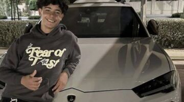 De zoon van Cristiano Ronaldo voor zijn Lamborghini Urus