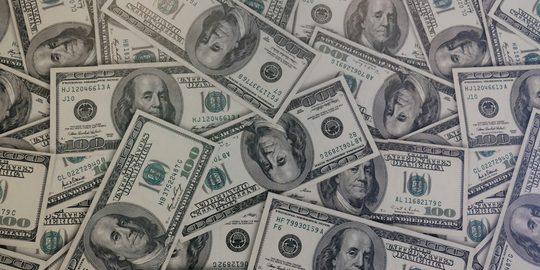 Een aantal dollarbiljetten van miljonairs in de Verenigde Staten