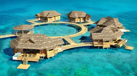 Illustratie voor: Droom Weg Met Deze Beelden Van de Eerste Caribische ‘Over-Water’ Suites