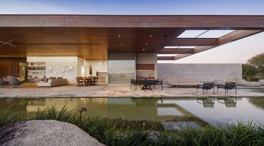 Illustratie voor: Het is Belachelijk Hoe Strak Maar Toch Gezellig Deze Moderne Villa in Brazilië is